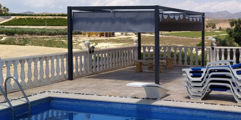 Pergola with retractable awning